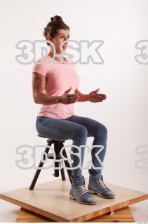 Sitting pose blue jeans pink t shirt of Oxana …